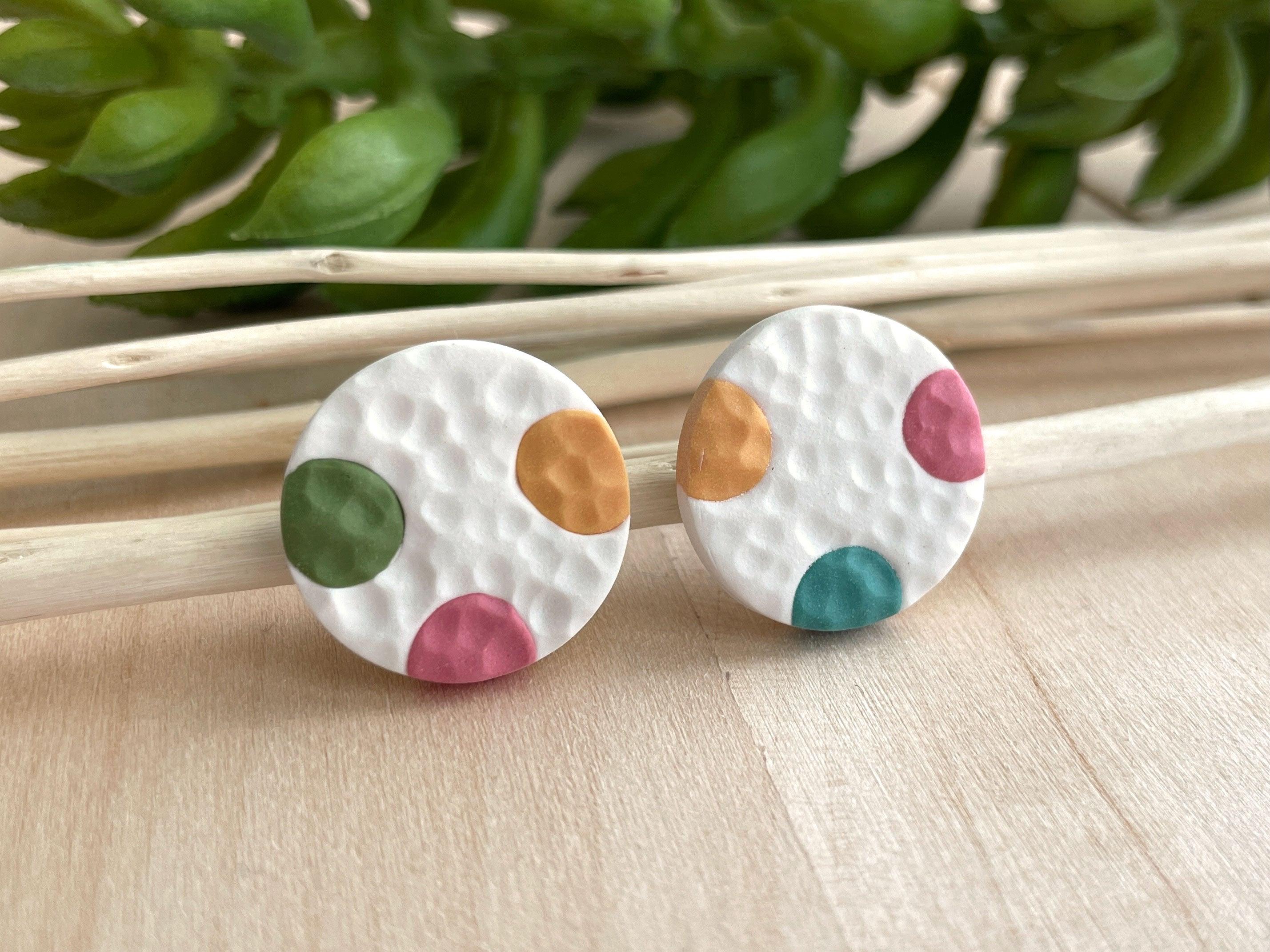 Heart polymer clay earrings. Lightweight earrings. Made in a modern clay  earring designs. Hoops,accent beads, and hearts make a great gift.